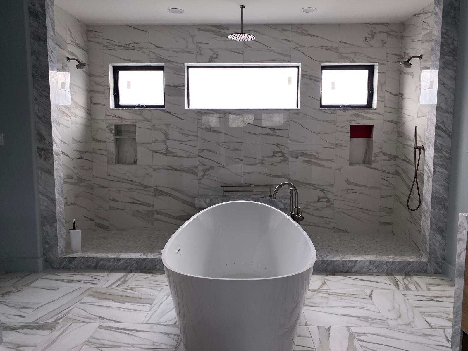 Marble primary bath with a freestanding tub and double shower, Montrose