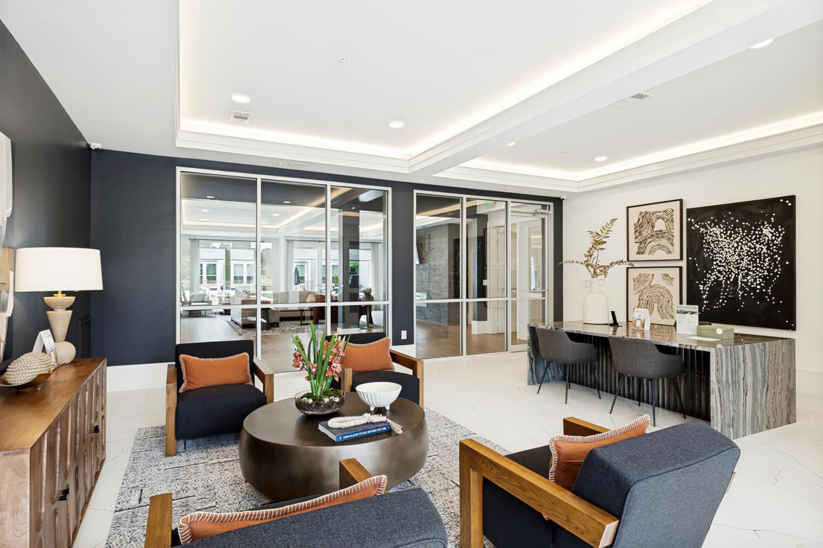 Leasing lobby with a marble desk, navy walls and oak furniture, Allegra at Shreveport