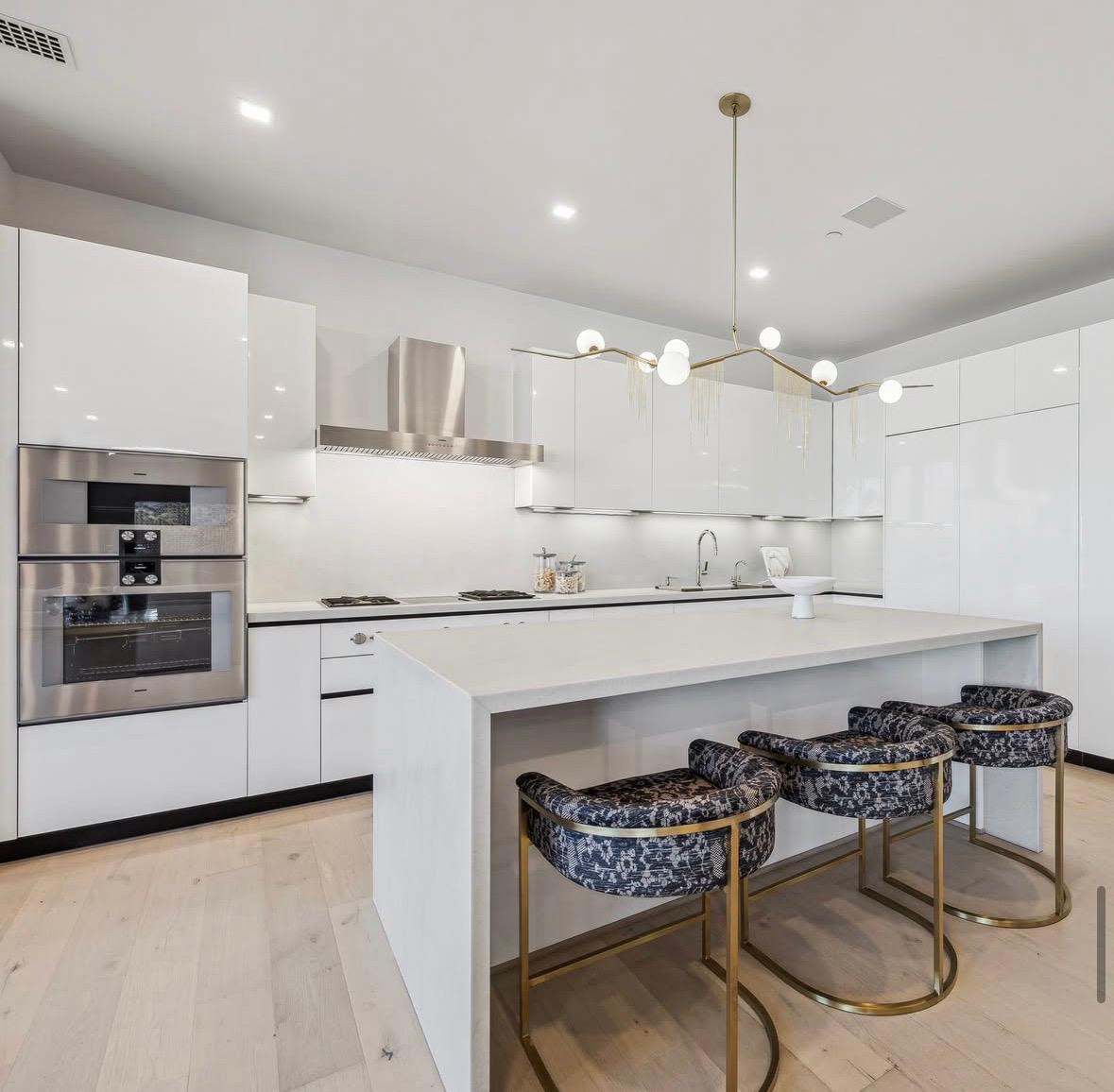 White gloss kitchen at The Residences at The Allen